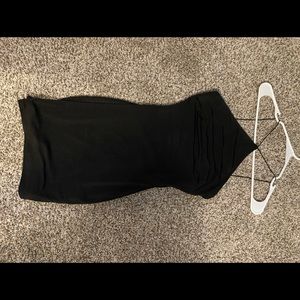 Black fitted cocktail dress.